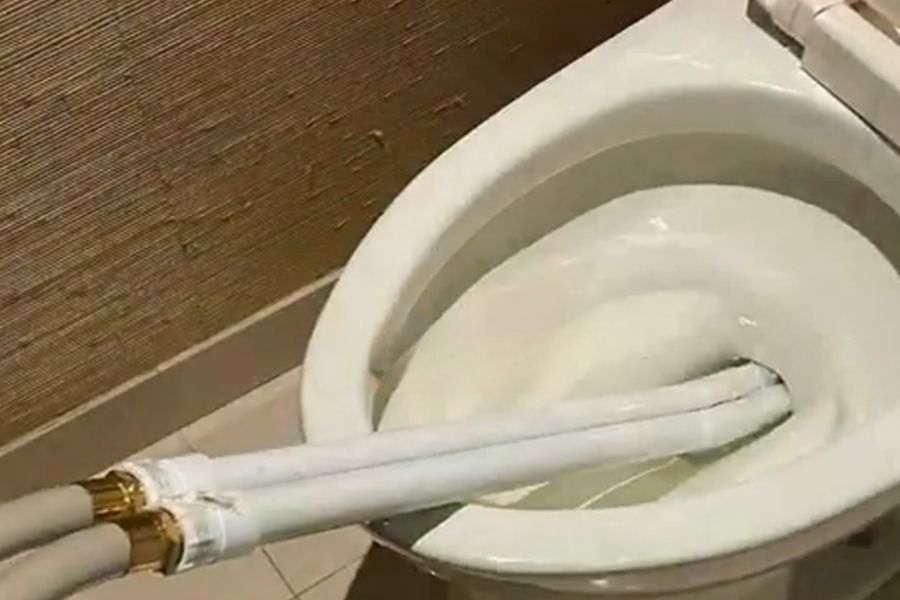 Pumping out a fire-damaged pool during cleanup